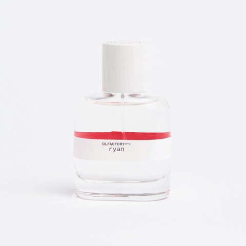 ryan fragrance bottle with orange stripe on label