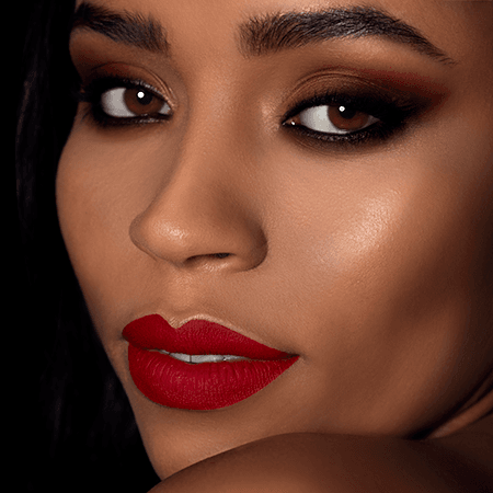 lipstick for dark skin, black girl makeup, black girl lipstick, deep skin red lipstick, best lipstick for deep skin, best lipstick for dark skin, perfect kuckian, kuckian, kuckian beauty, kuckian cosmetics, bright red lipsticks, matte red lipstick, red lipstick makeup, red lipstick lips, lips with red lipstick