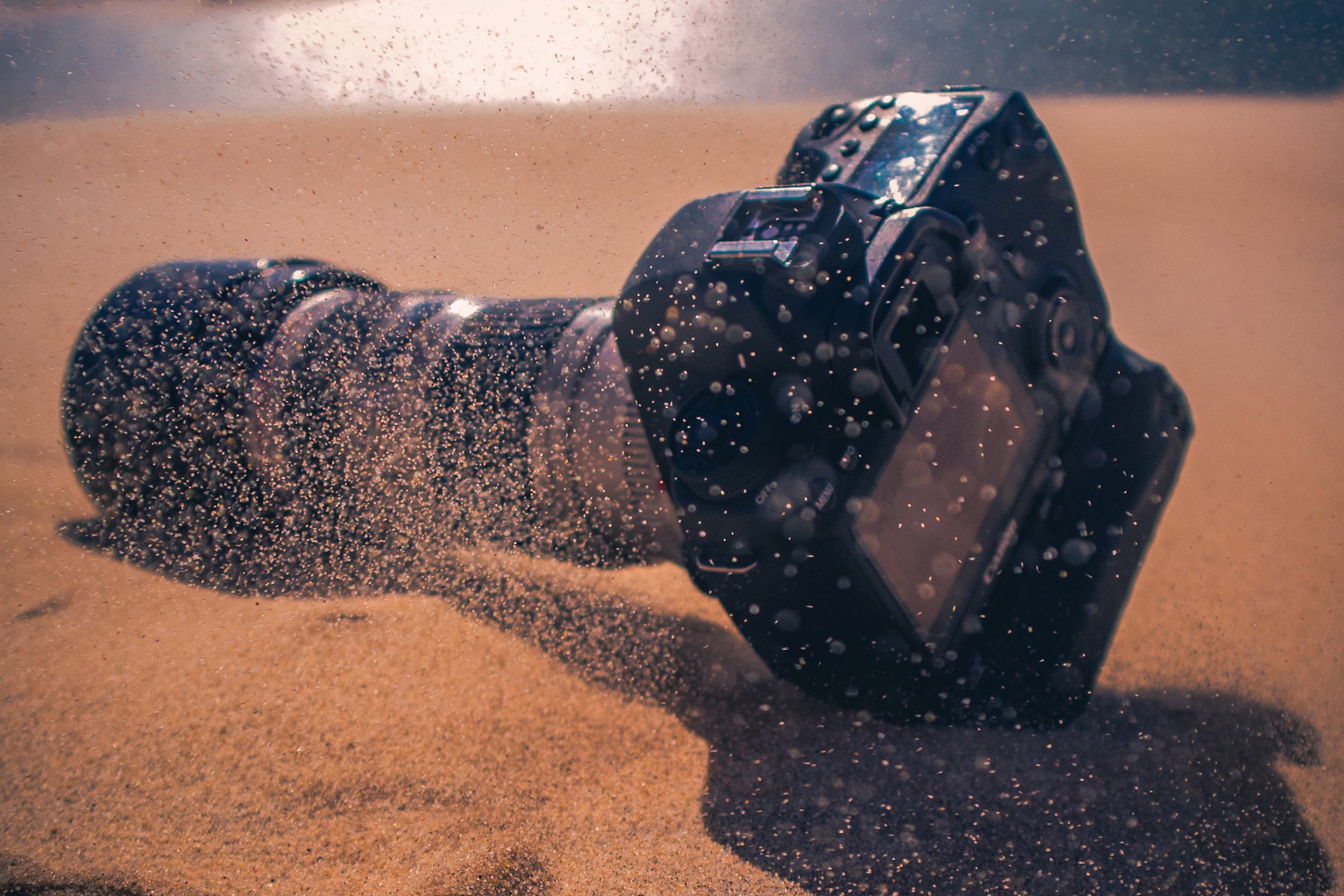 sand gets in a camera while hiking in the desert
