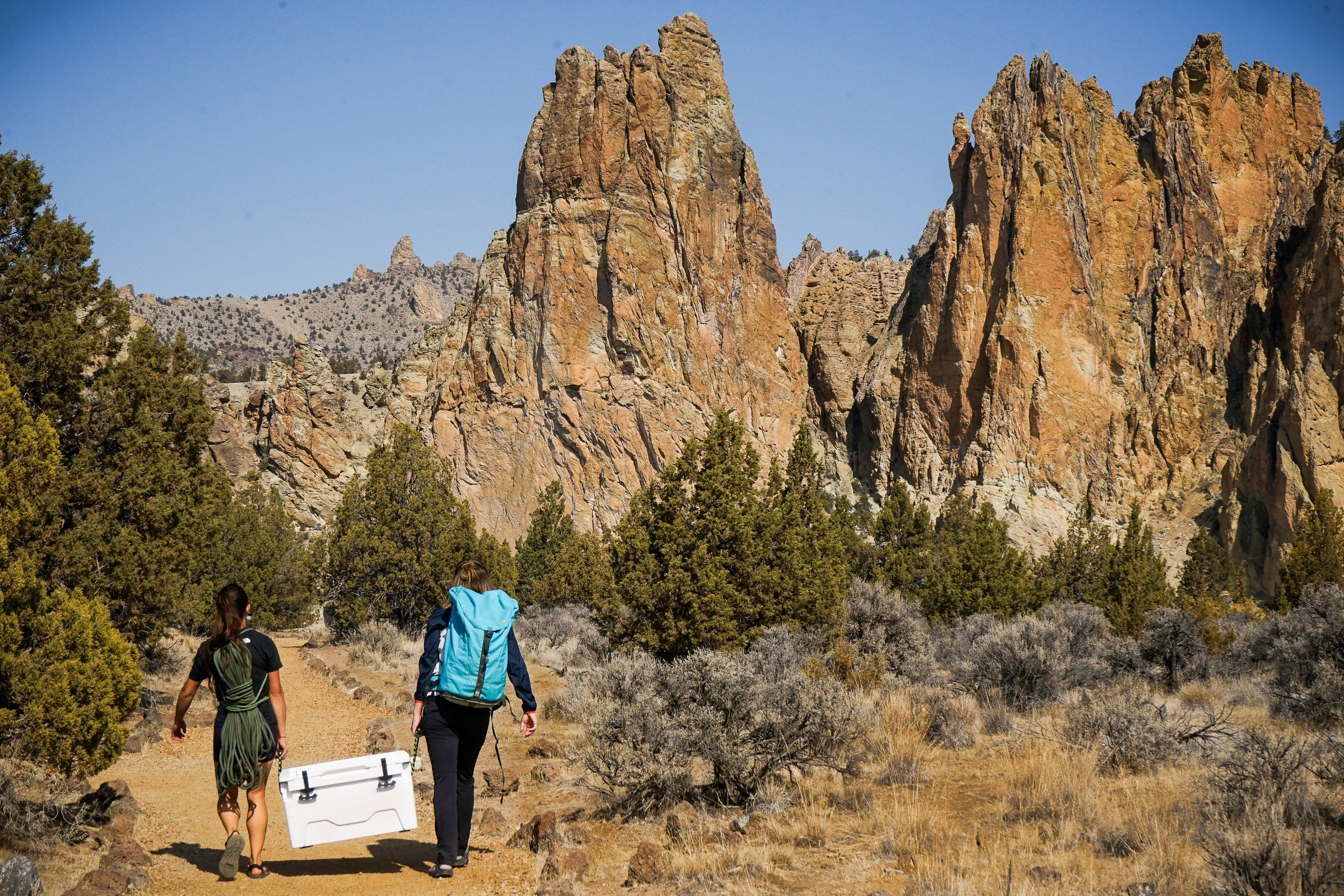 carrying a camping cooler with durable woven rope handles