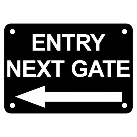 Entry Next Gate with a Arrow pointing left. Sign has a Black Background with White writing/engraving