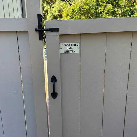customer installed sample sign Please Close Gate Gently