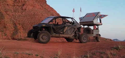 UTV With Trail Trailer Attached Carrying A Roof Top Tent