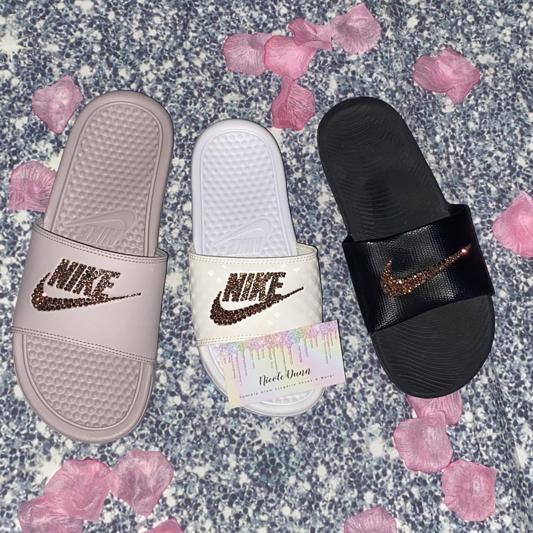 pink and gold nike slides