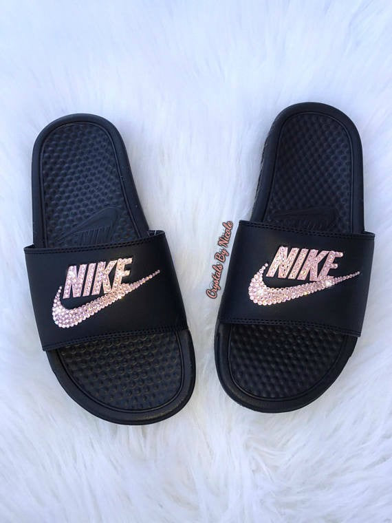 black and blue nike slides