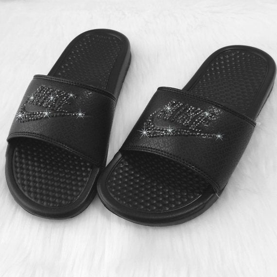 black and grey nike slides