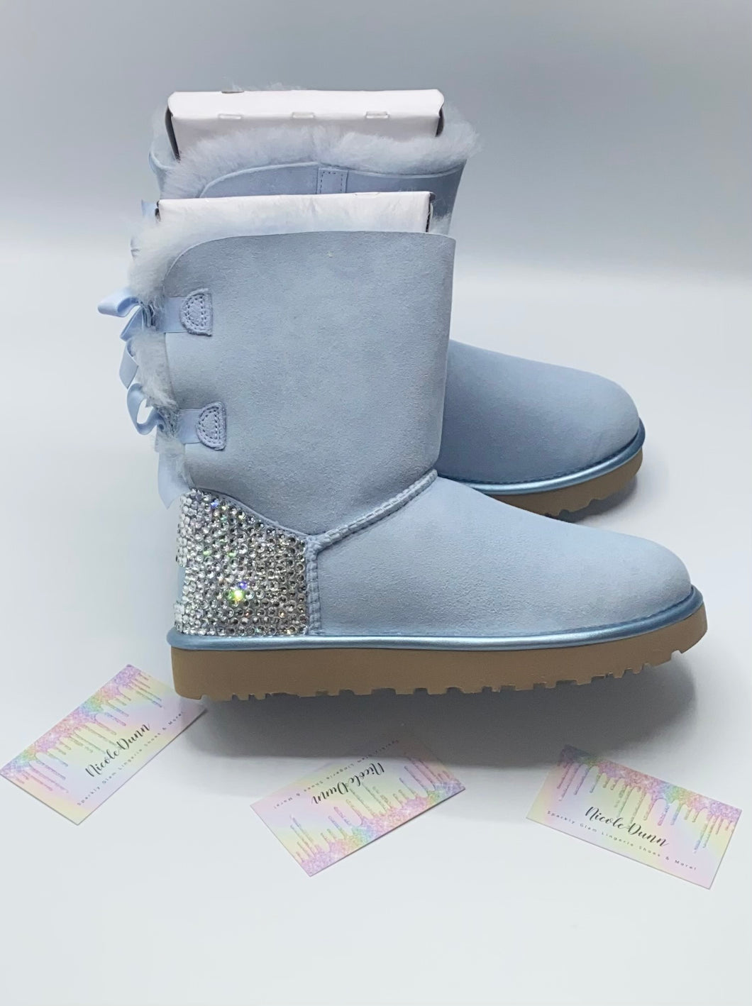 light blue uggs with bows