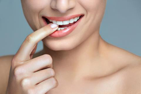 Compare the cost between home teeth whitening and dentist teeth whitening.