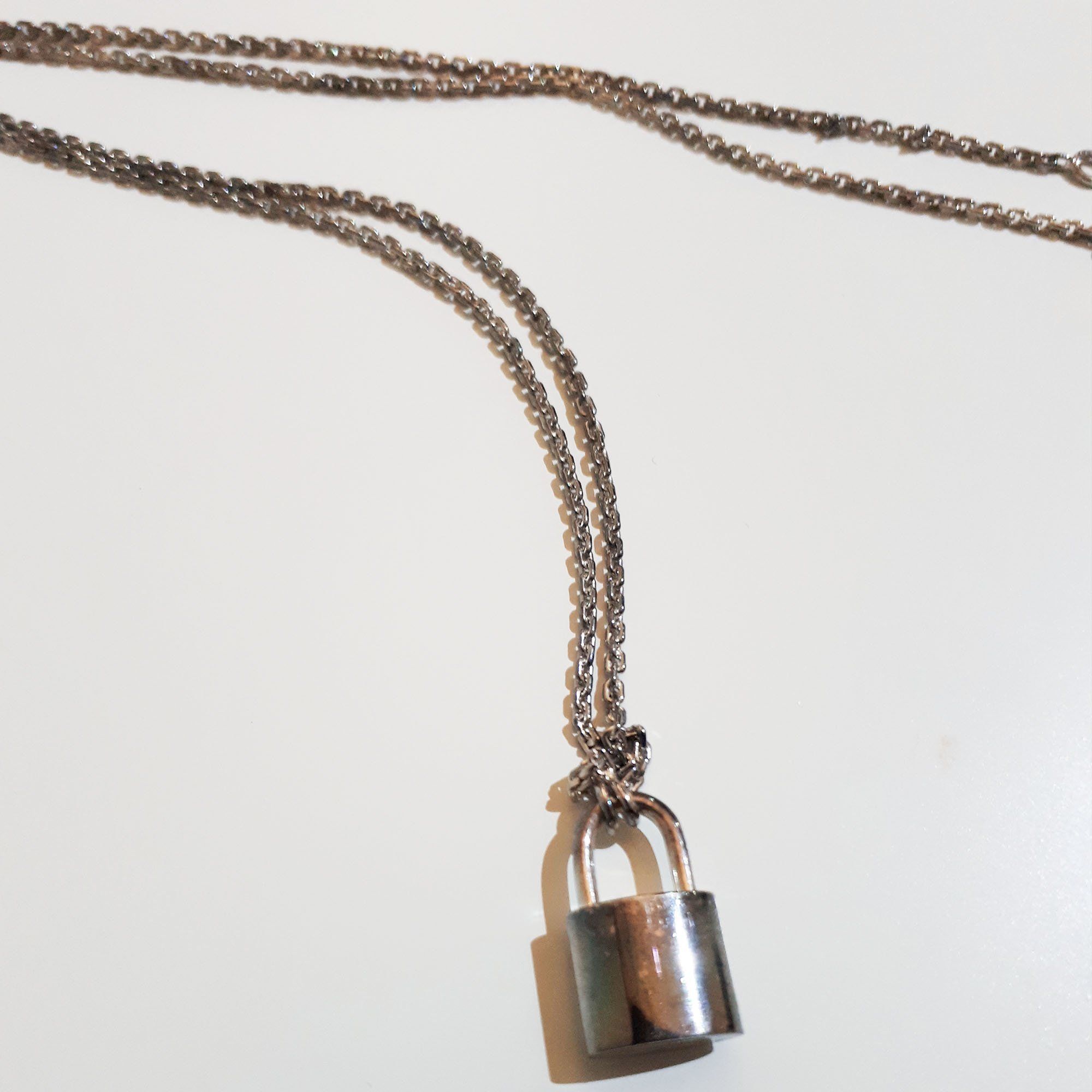 Louis Vuitton Silver Lockit Pendant Sterling Silver Necklace – Garderobe