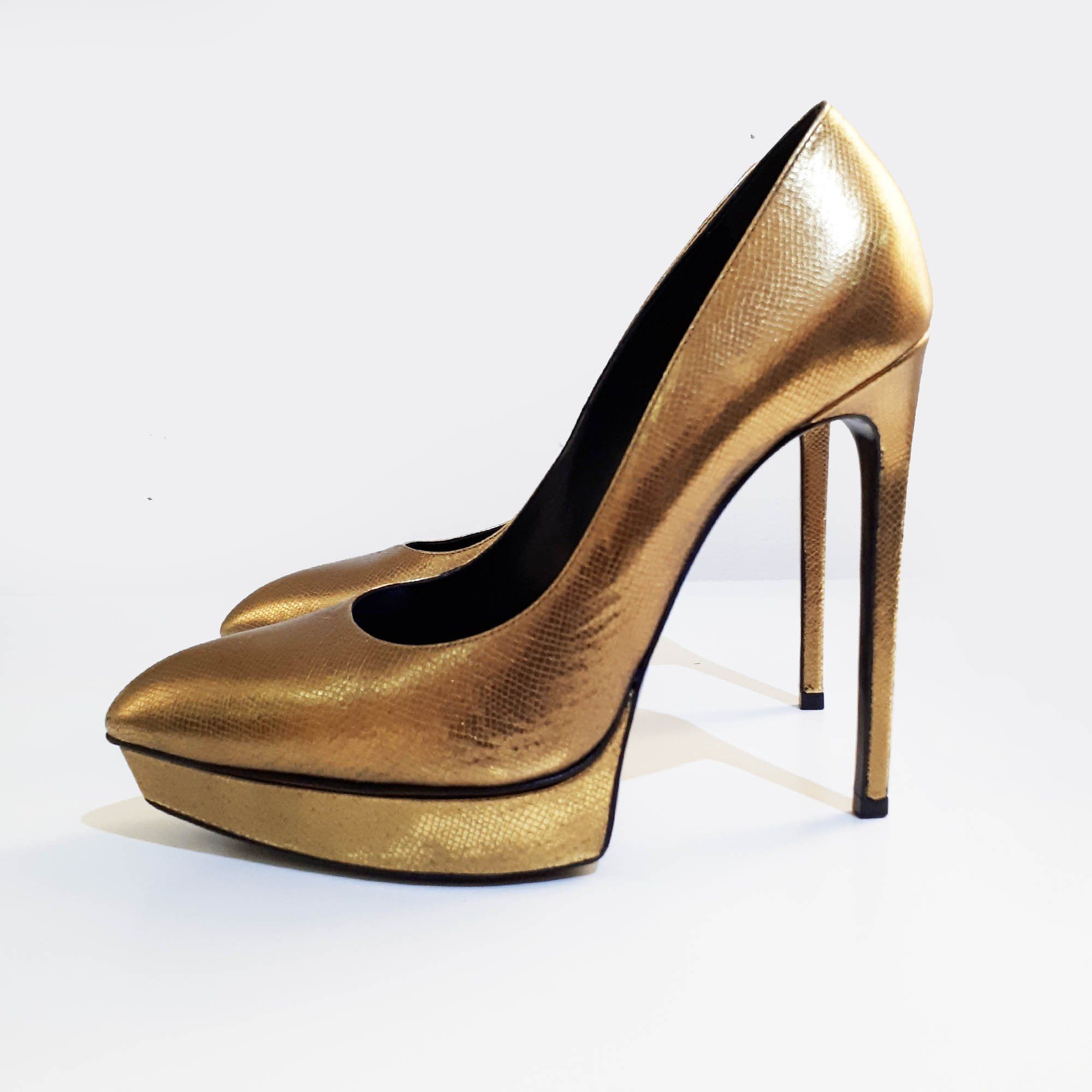 gold platform pumps