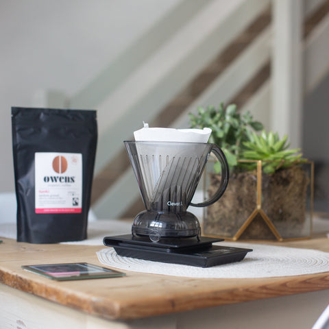 Clever Dripper coffee maker on countertop with bag of Owens Coffee