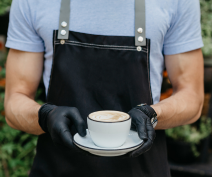 Waiter serving organic coffee