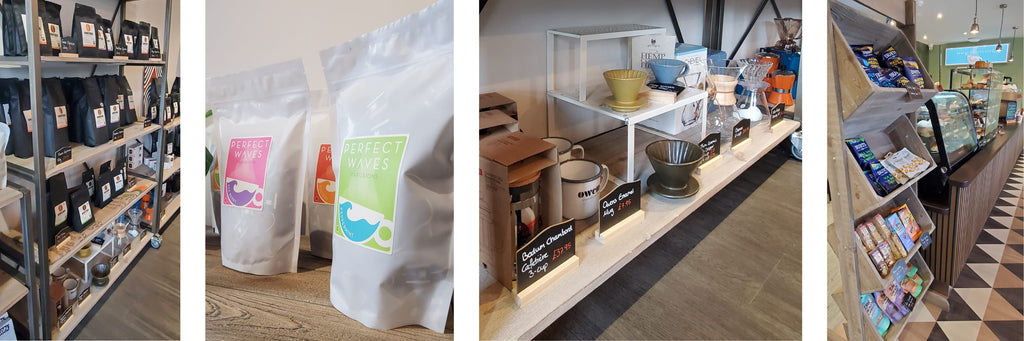 Coffee beans and brewing equipment on the shelves of the shop at Perfect Waves Cafe