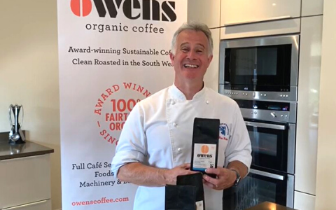 Peter Gorton Master Chef of Great Britain holding Owens Coffee