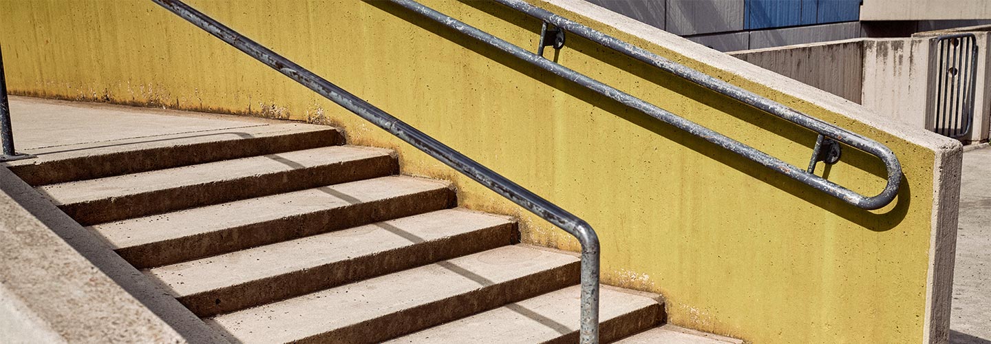 adidas' image of concrete stairs with yellow wall