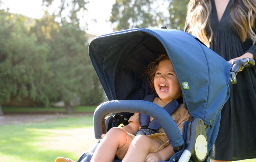 Baby smiling in Bumbleride stroller