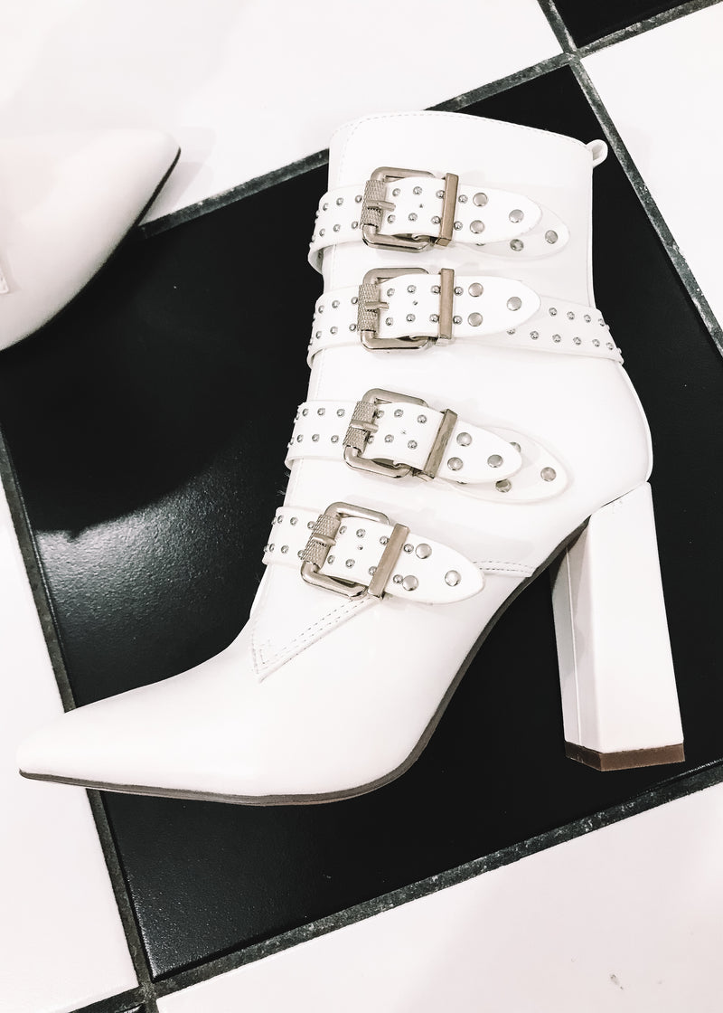 white booties with buckles