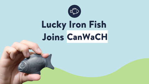 Text: Lucky Iron Fish Joins CanWaCH with photo of a hand holding a Lucky Iron Fish