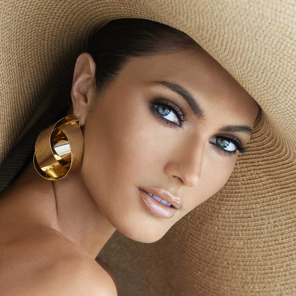 Female Model Wearing Giant Hat