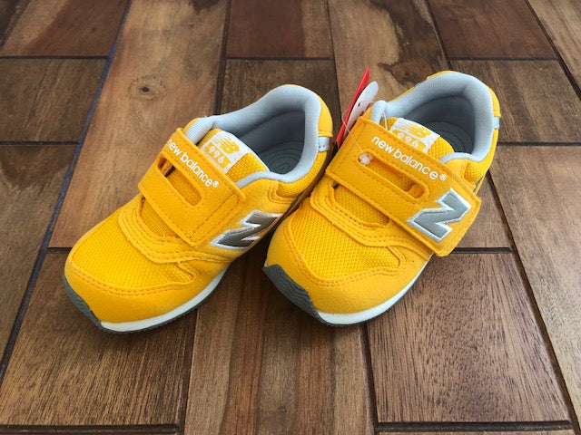 yellow new balance kids