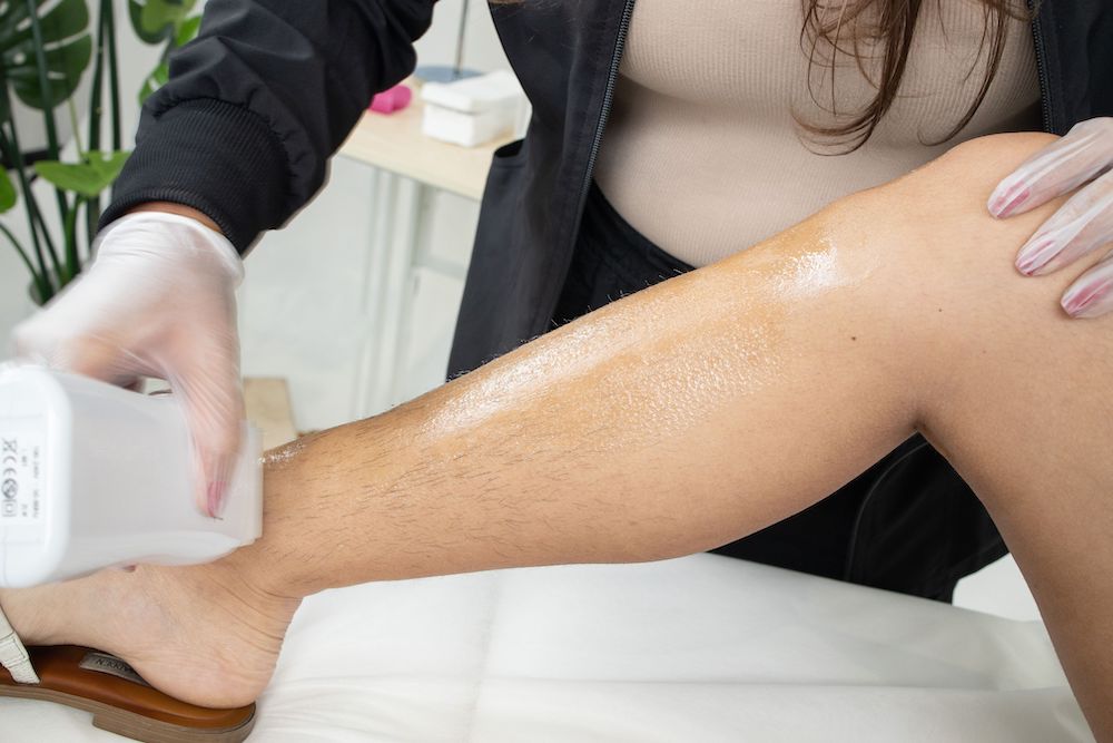 women shaving legs