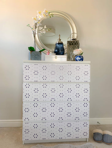 White flatpack chest of drawers revamped with Nutmeg furniture stickers in a navy blue flower pattern
