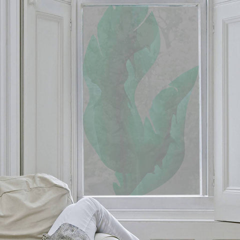 Large Tropical Leaves Window Film on a while-framed window
