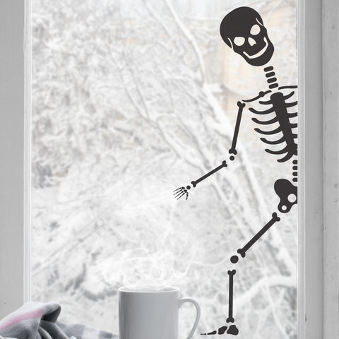Window with a black skeleton window sticker