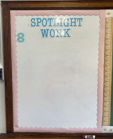 "Spotlight Work" Marker board with AccuCut letters cut out.