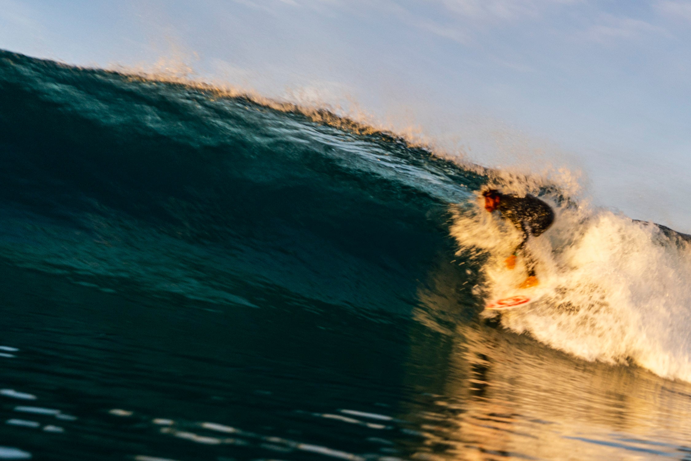 Guy catching a wave 