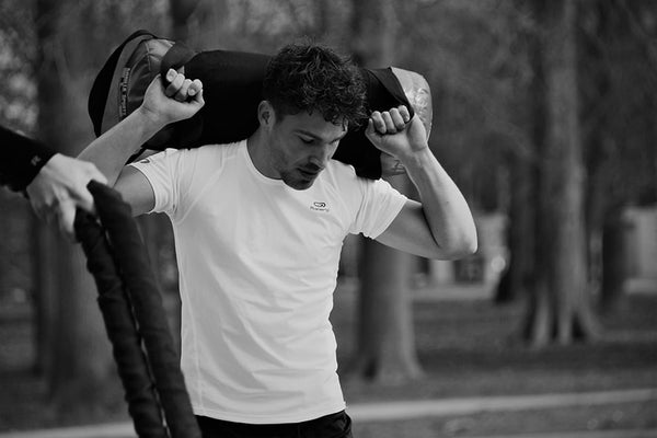 Sandbag Carry for Obstacle Racing Strength