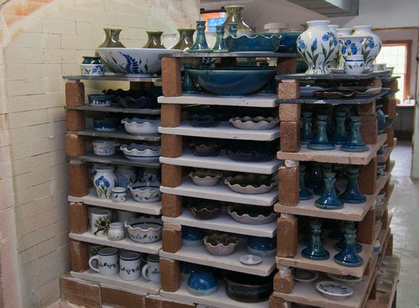 Pottery stacked and ready for the kiln
