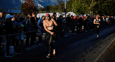 Practising wetsuit removal - both arms out of your wetsuit