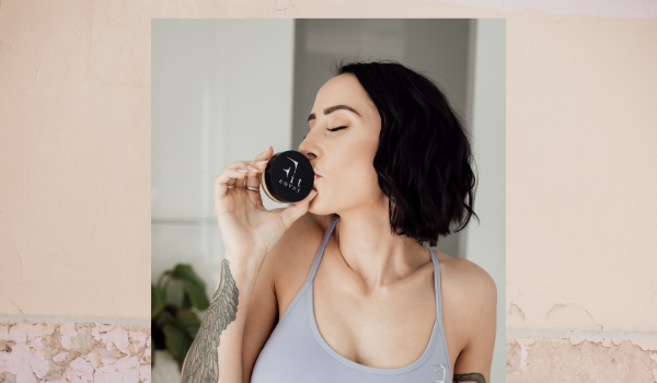 Nova Jane kissing a jar of Active Mineral Foundation