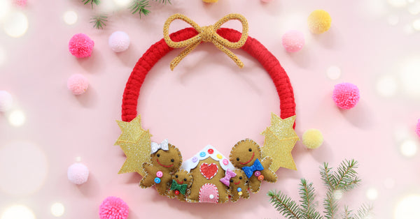 Gingerbread Family Christmas wreath created for Kirstie's Handmade Christmas using knitting cords made on a knitting mill