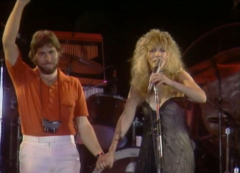 Steve Wosniak at Us Festival 1983 with Stevie Nicks. Nice pants, Steve.