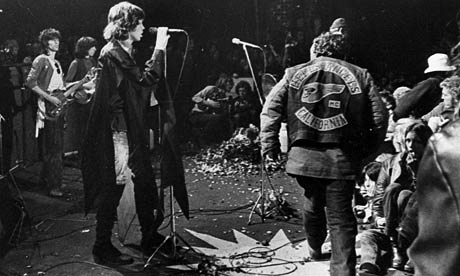 Jagger looks on as the Hells Angels remove someone from this life