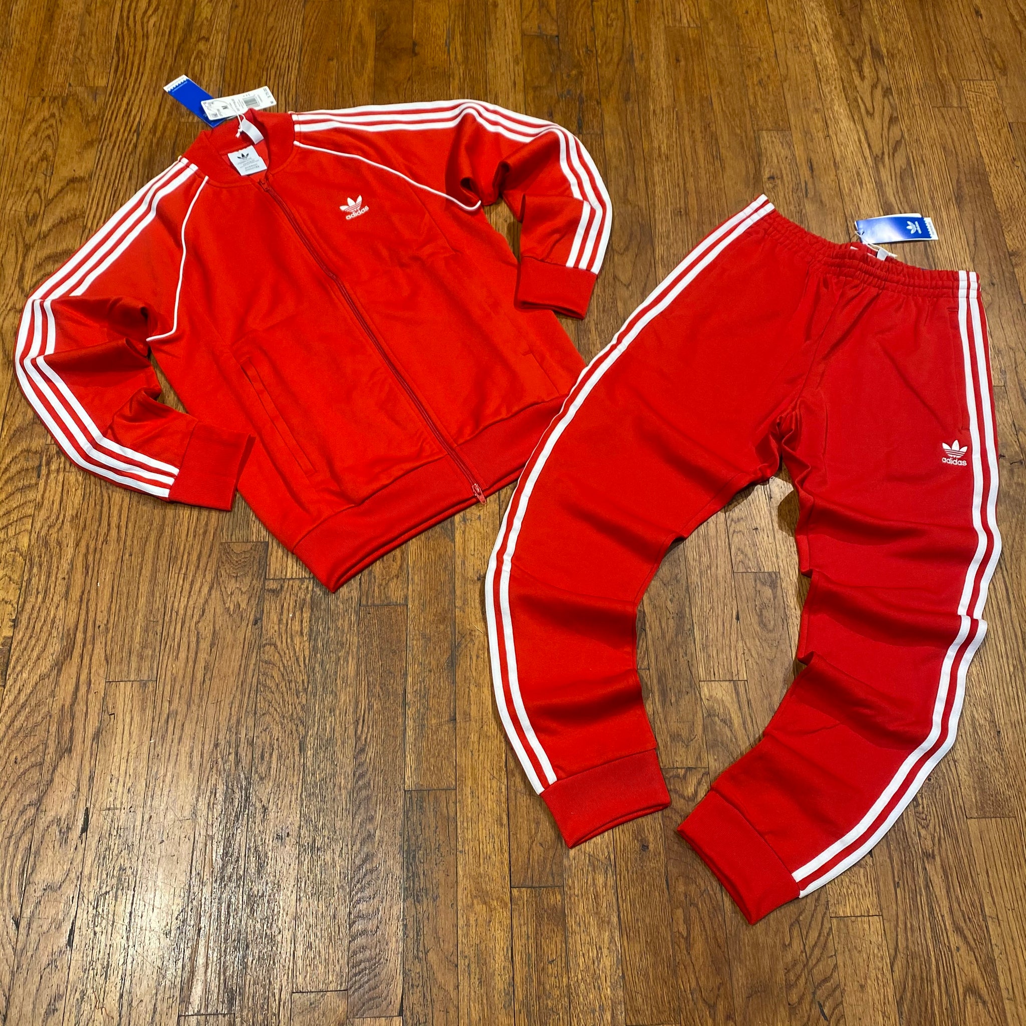 red and white adidas tracksuit mens