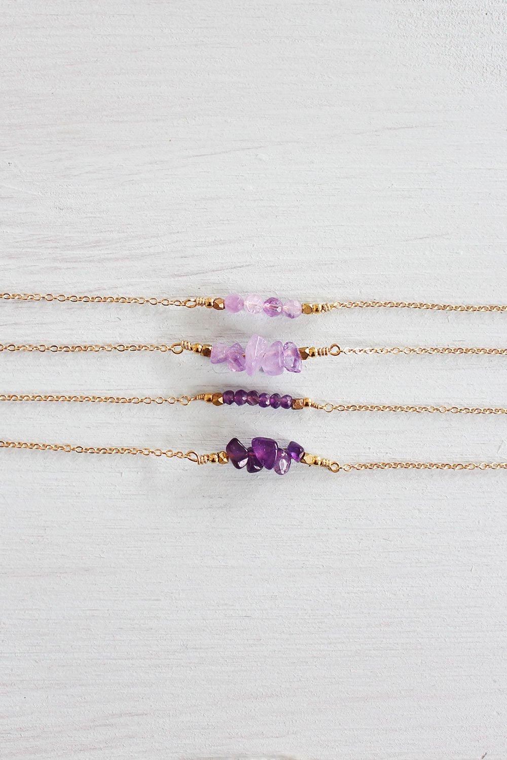 Amethyst bead bar necklaces in different shades of amethyst.