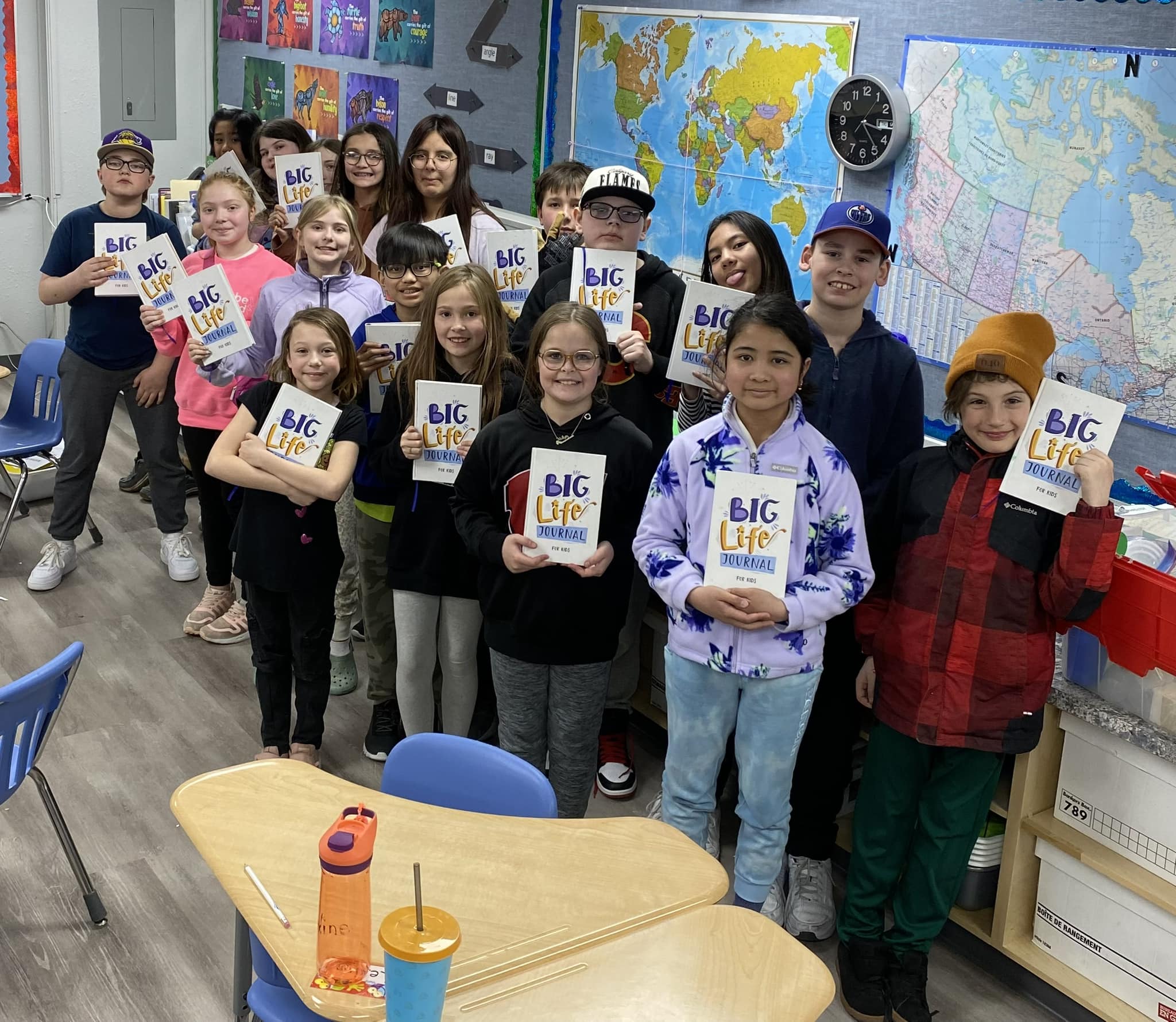 Fox Creek School kids holding BLJ journals