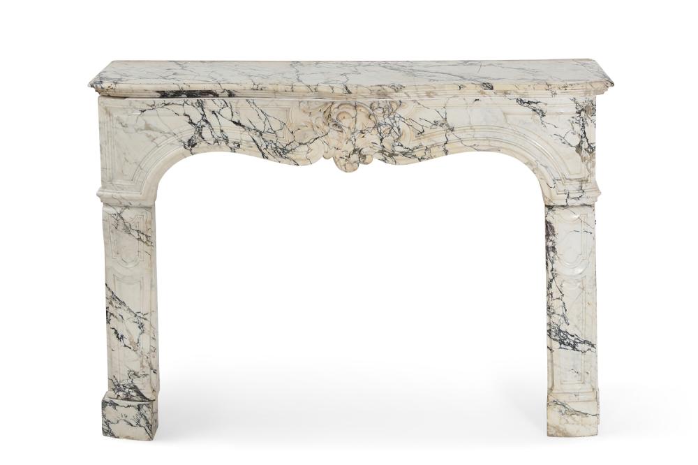 A French black variegated white marble fireplace mantle surround late 19th century
