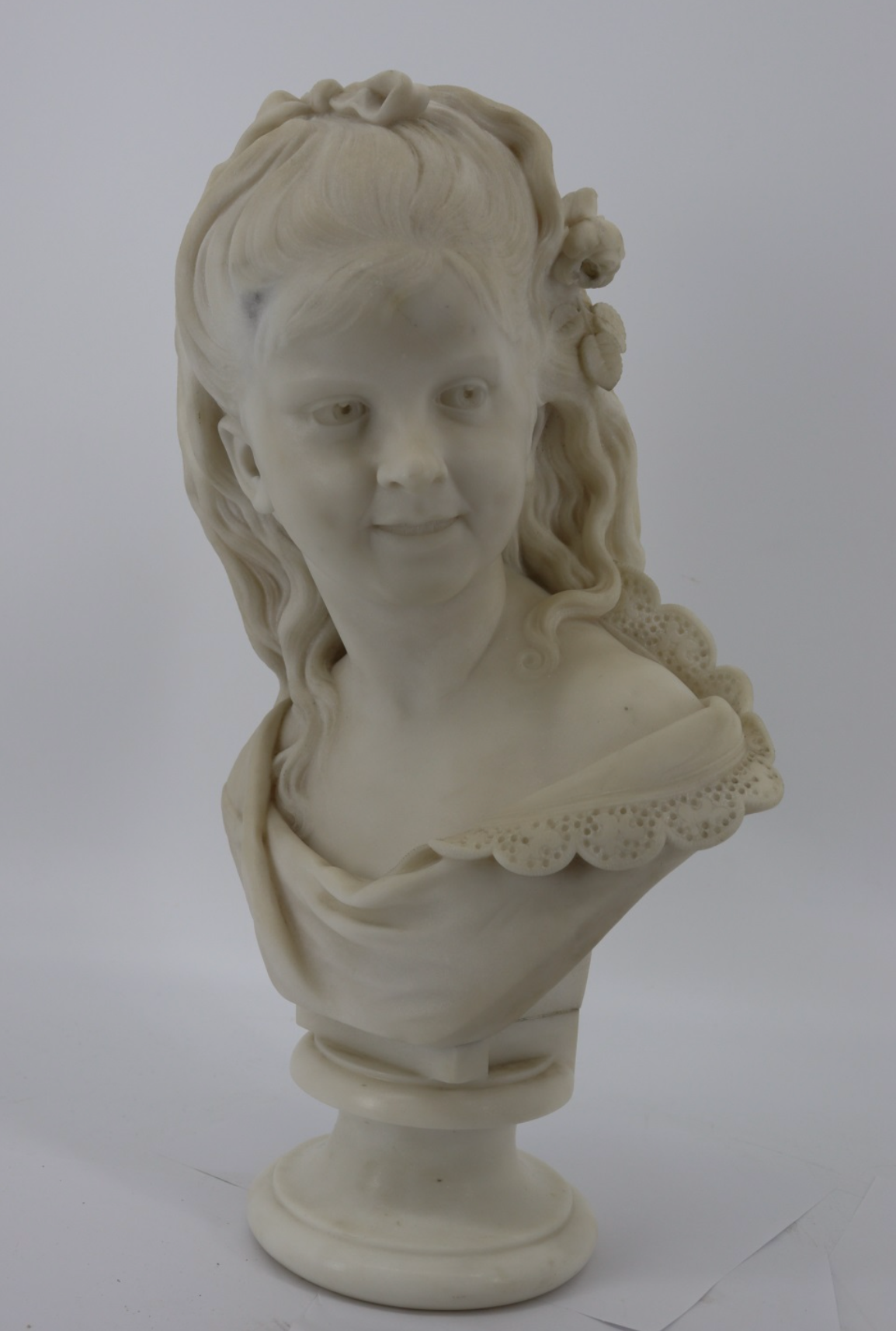 Finely Executed Marble Bust of a Young Girl