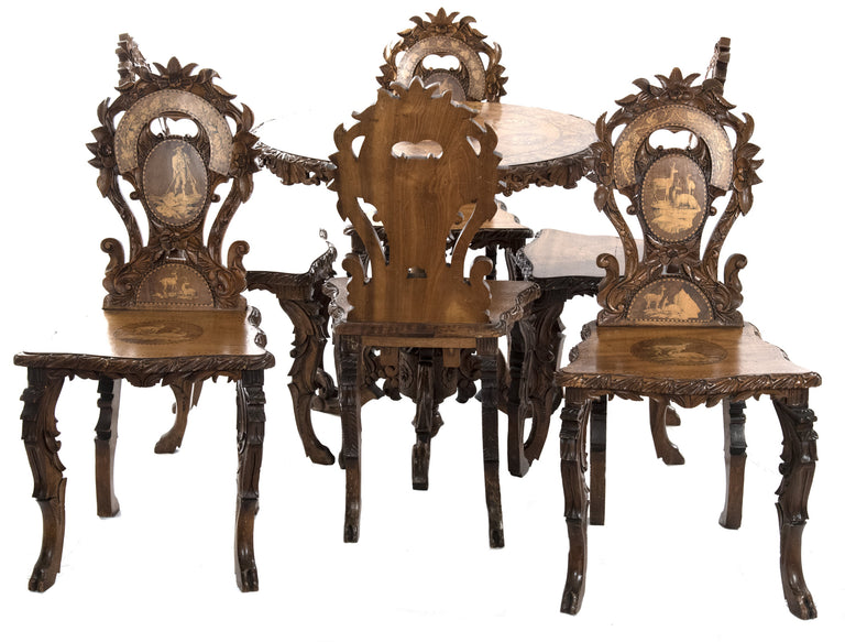 Swiss Black Forest Carved Marquetry Tilt Top Table And Chairs