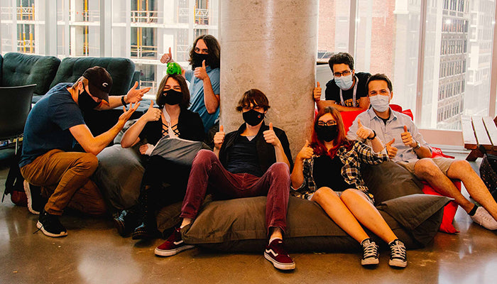 Students at Université du Québec à Chicoutimi's School of Digital Arts, Animation and Design working in a collaborative space filled with Fatboy beanbags.