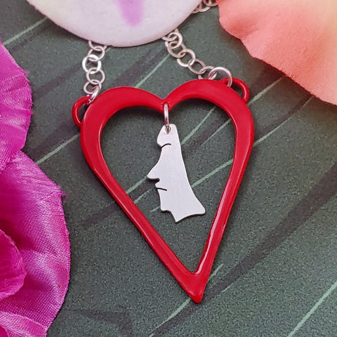 Red heart with sterling silver moai head necklace