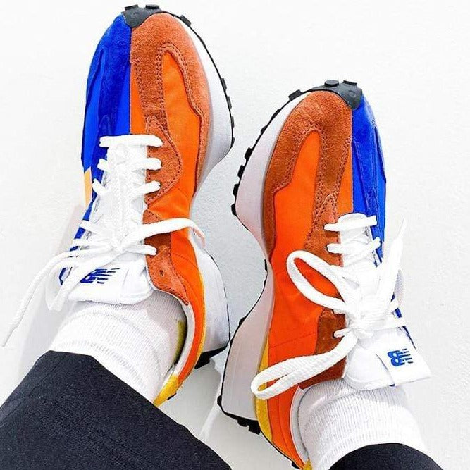 orange and blue new balance shoes