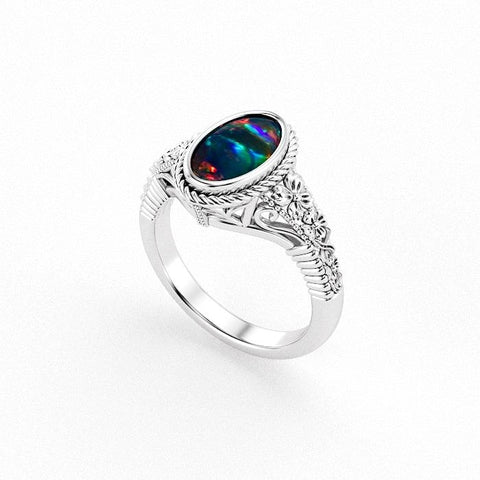 Christine Alaniz Designs custom oval opal ring with vintage floral engraving