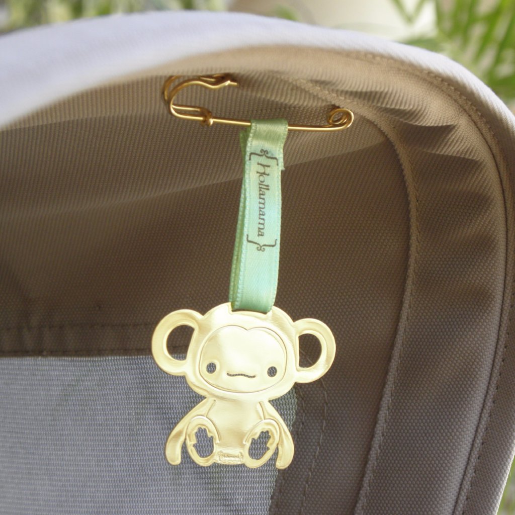 handbag with monkey charm