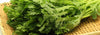 Edible Chrysanthemum Greens on a Woven Mat
