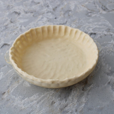 Unbaked prepared pie crust shell